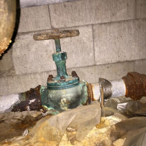 old-plumbing-system-pipes-hutchinson-ks