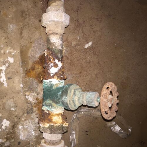 side-old-plumbing-system-pipes-hutchinson-ks
